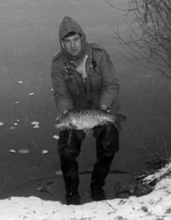 Gerry Savage catching fish in cold winter